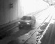 Car Drives Down Train Tracks