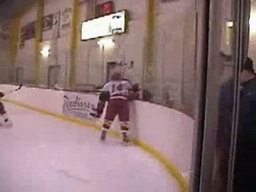 Hockey Player Breaks Glass